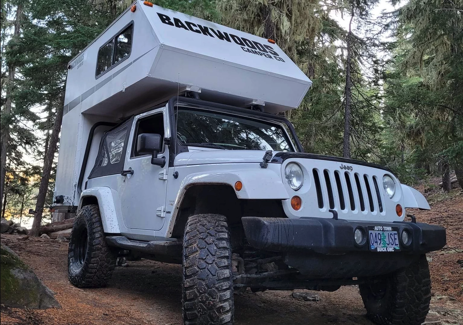 The Backwoods Camper adds some rare fully protected hard-sided shelter to the two-door Jeep Wrangler or your SUV of choice