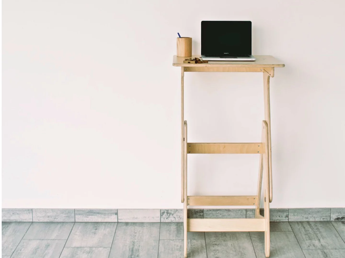 The desk sports an additional shelf for extra storage space