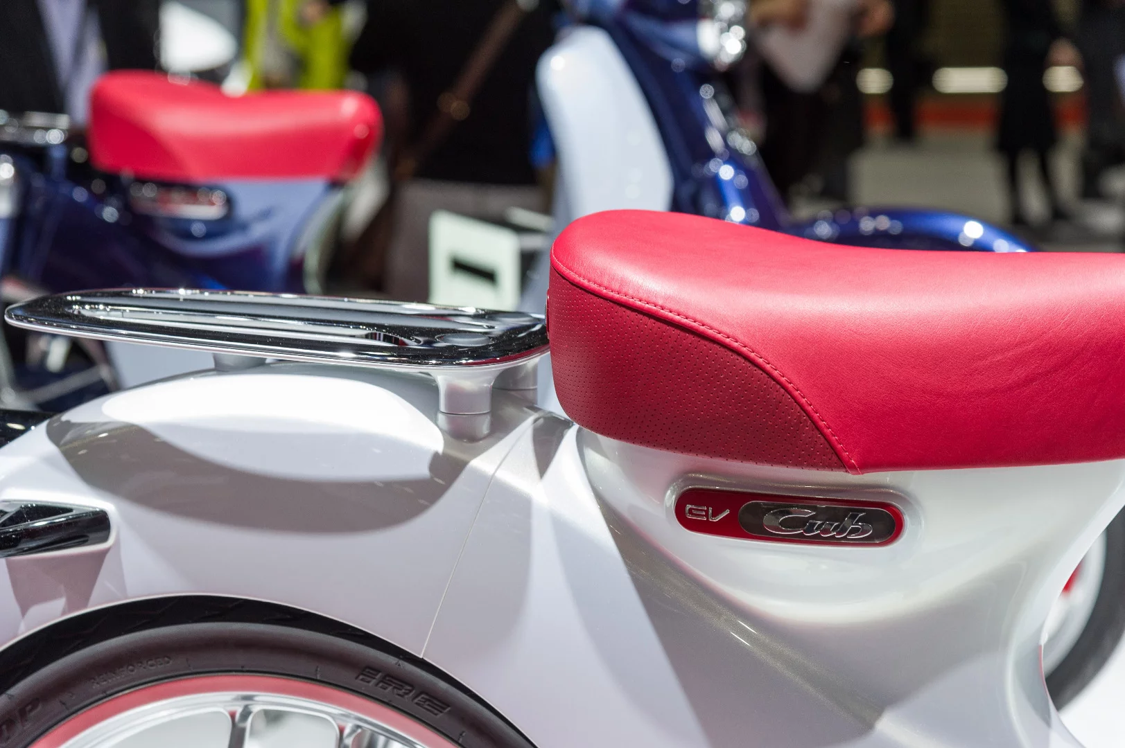 The area under the seat of the Honda EV-Cub will probably offer some carrying space for things like the battery charger