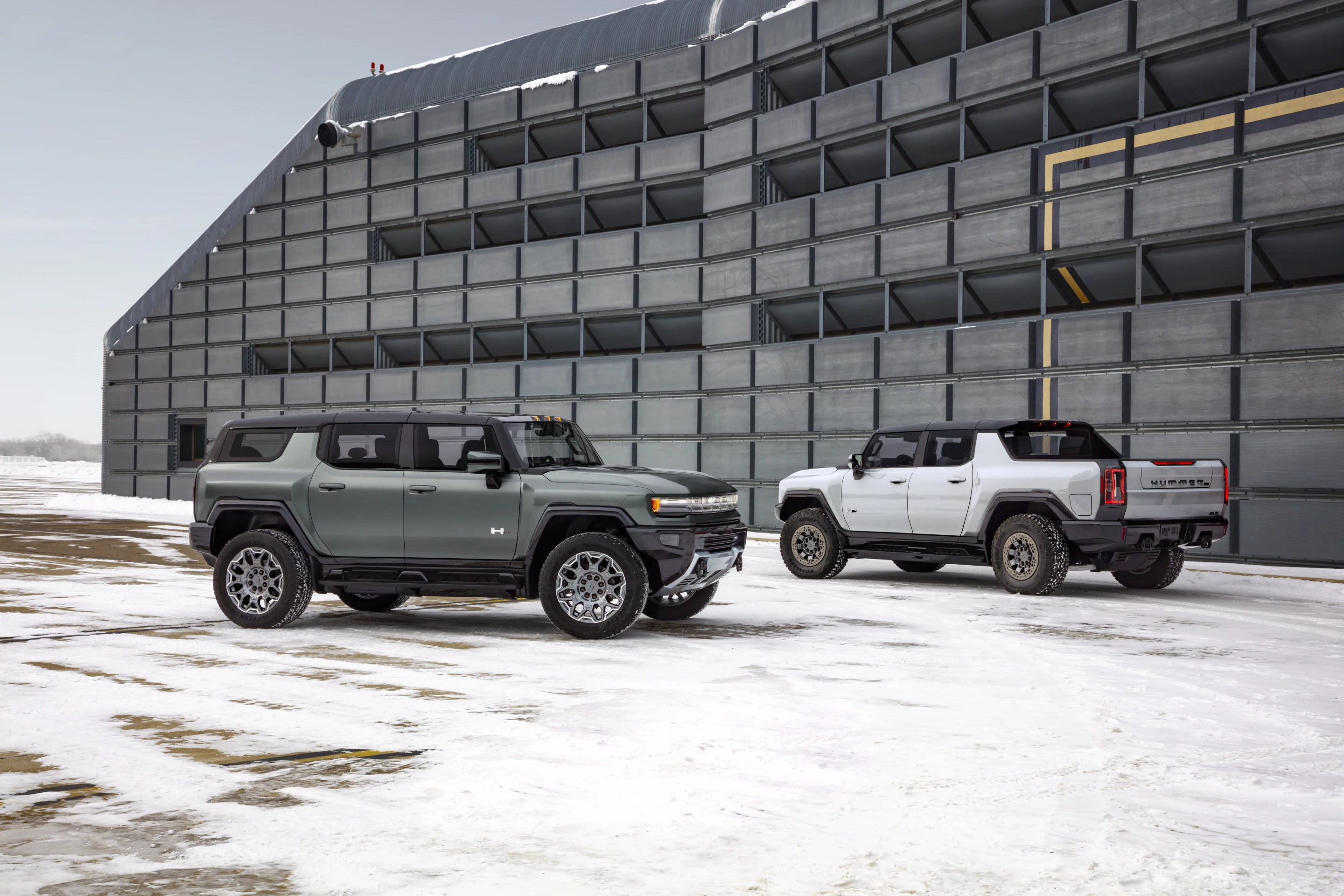 The wheelbase difference between the Hummer EV SUV (front) and Pickup (rear) is about 9 inches