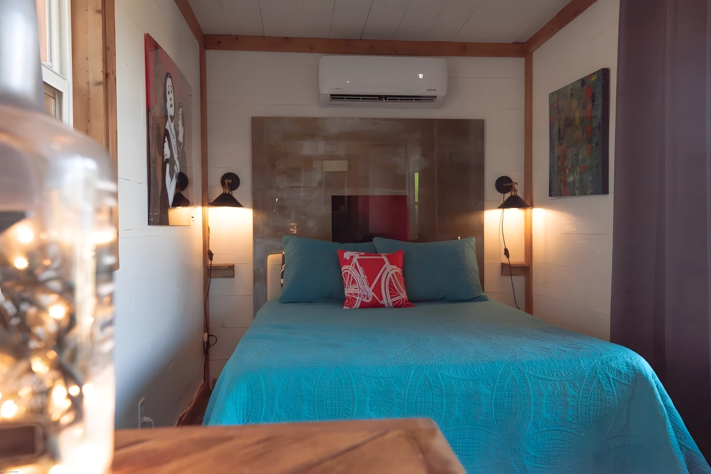The Teeny Tiny Haus includes a double bed that can double as a daybed, since there's no sofa installed in this model