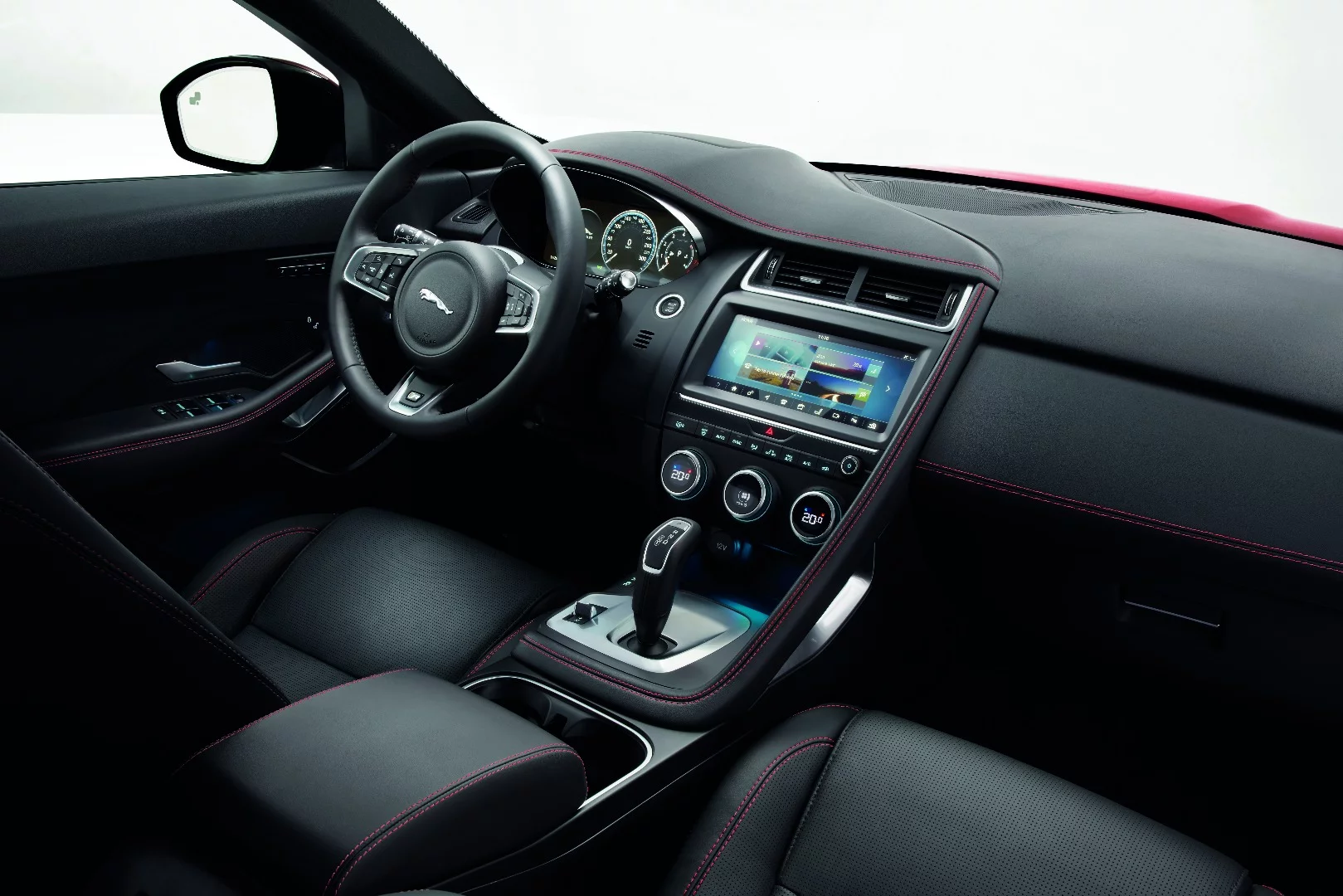 A passenger grab handle helps create a border for the driver area