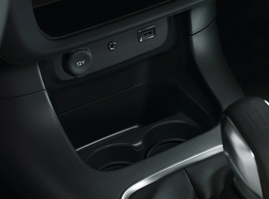 The center console has plenty of room for bottles, phones and wallets