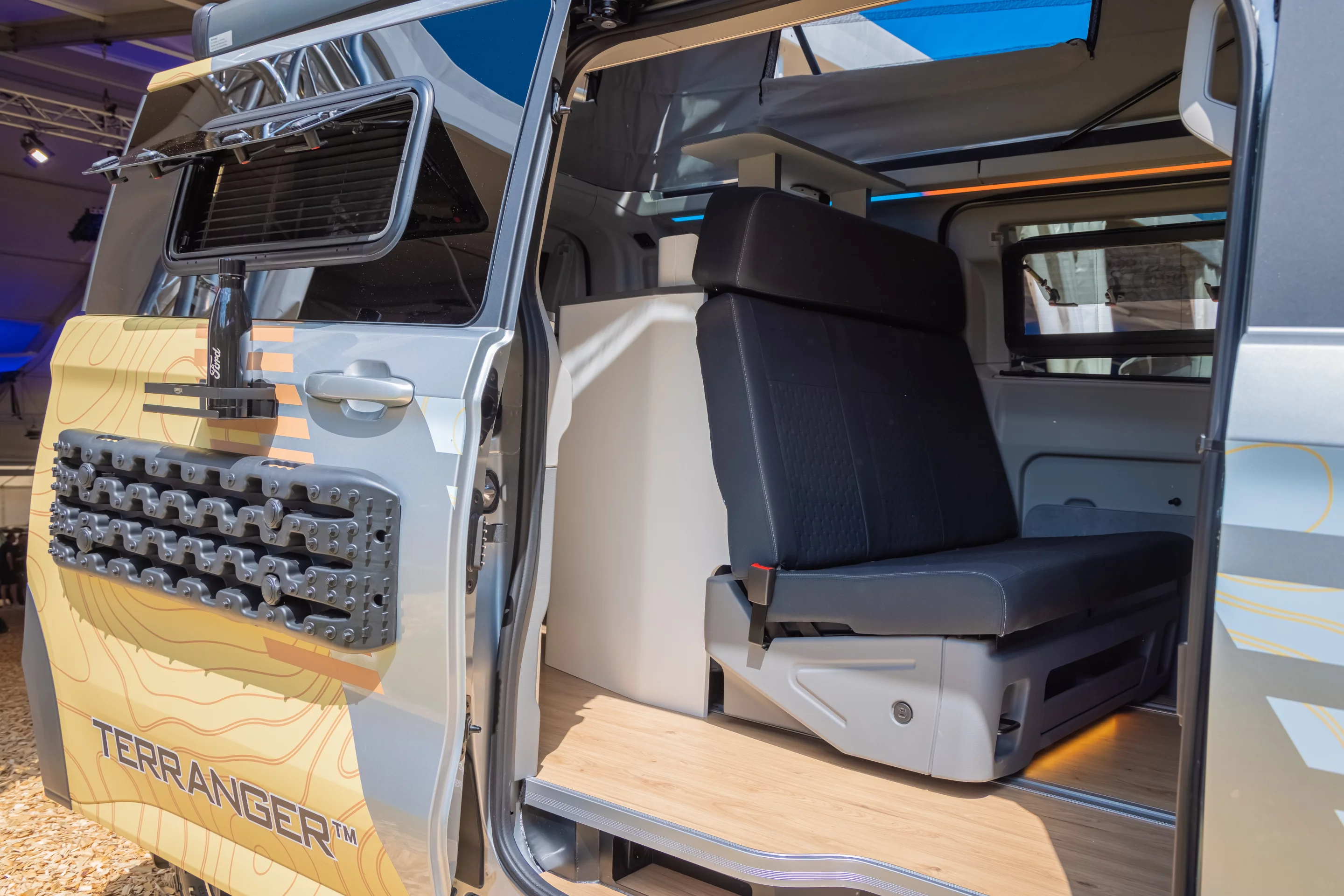 Ford/Westfalia's multi-zone layout remains intact, with a rear kitchen, front dining lounge/bed and pop-top bedroom