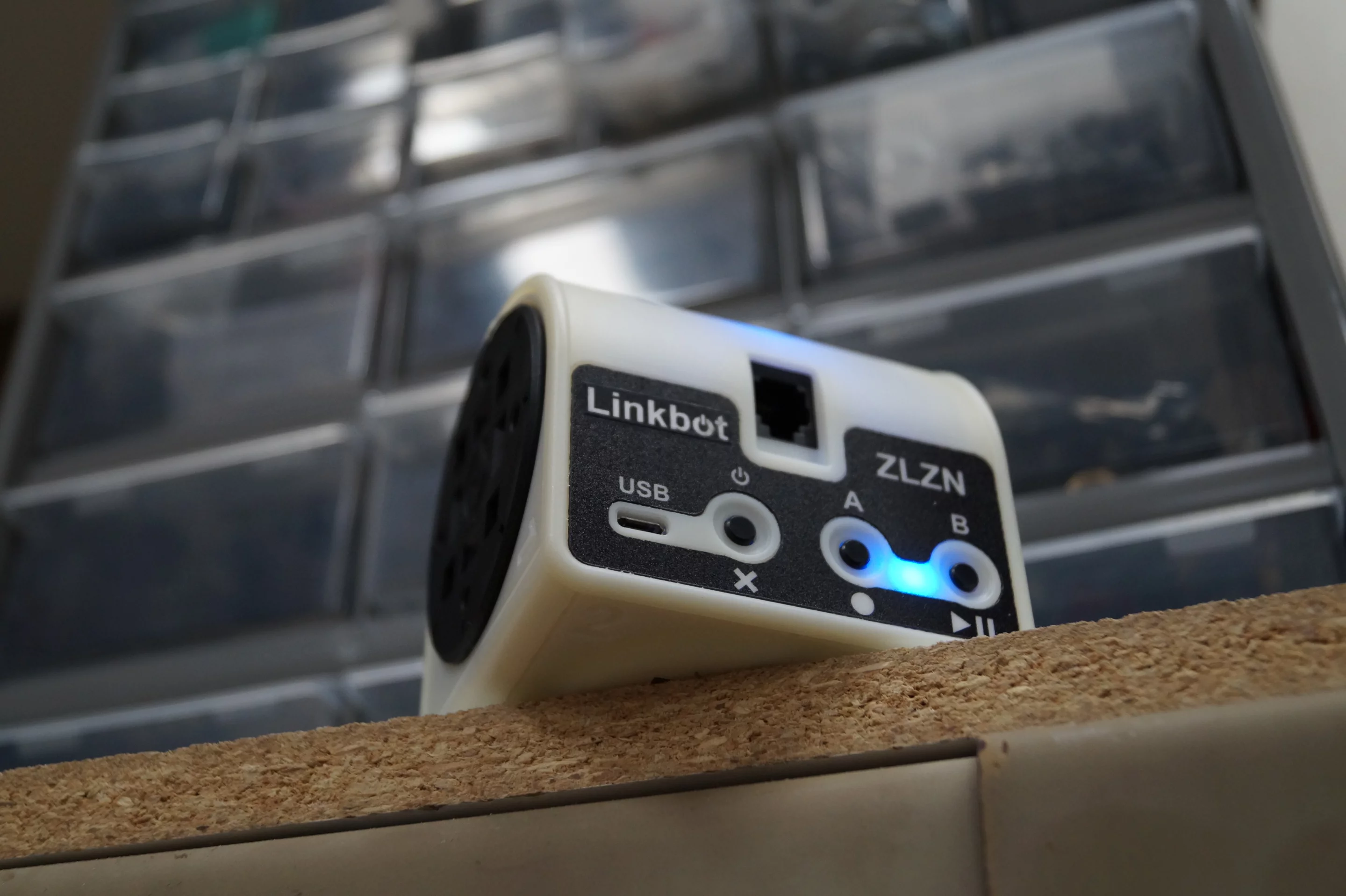 Each Linkbot is built around an ATmega128RFA1 microcontroller from Atmel with integrated 2.4 GHz radio transceiver
