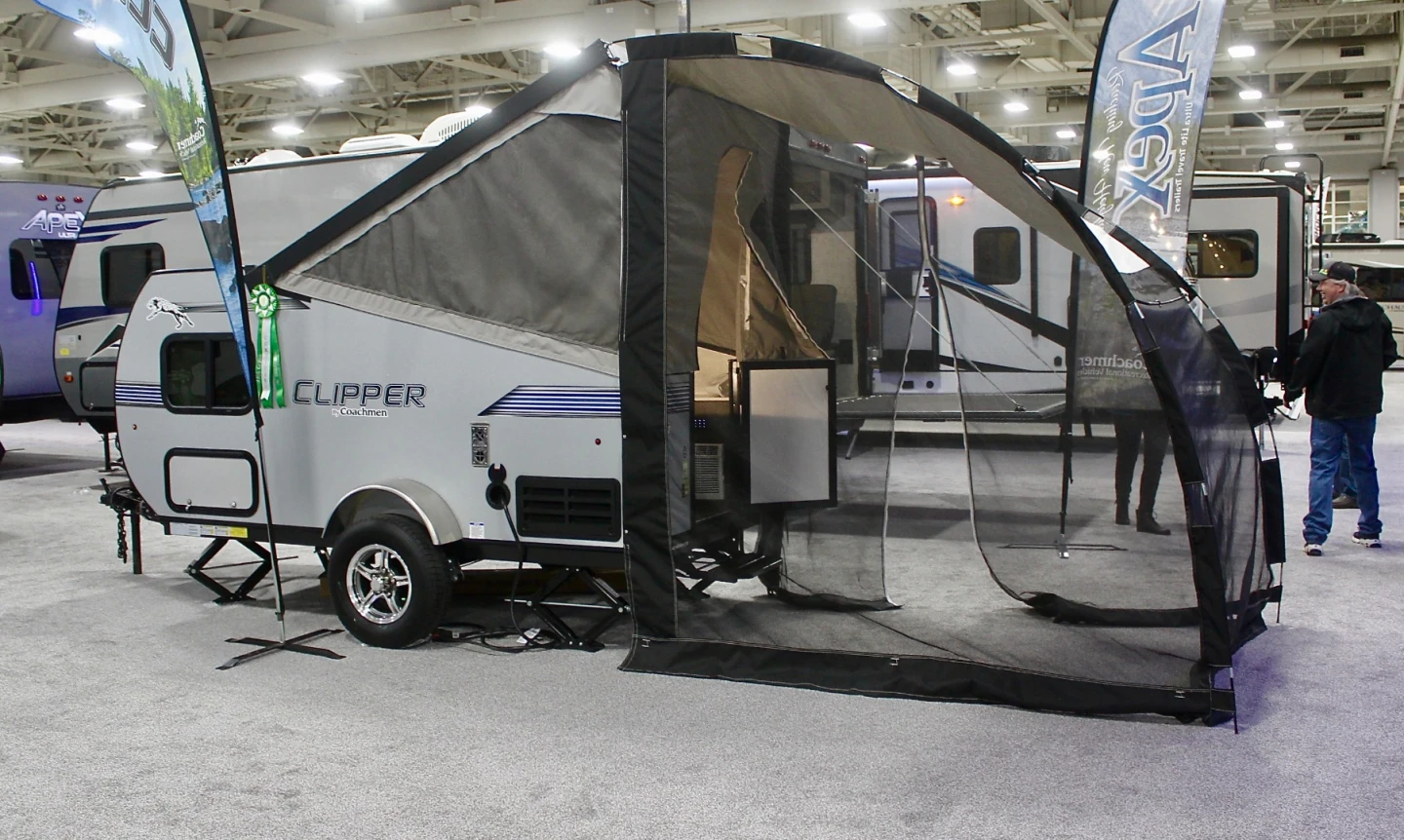 Small camping trailers are growing in popularity, and it's not just startup innovators that are selling them. Here, Coachmen, a motorhome/trailer brand of RV giant Forest River, shows the 13-foot (4-m) Clipper Express 9.0TD (teardrop), a cool, little combination of teardrop and pop-up tent trailer