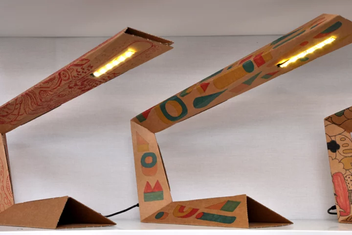 The 01LAMP foldable desk lamp is what you get when four young Italian designers get together and start folding old pizza boxes (photo Edoardo Campanale/Gizmag)