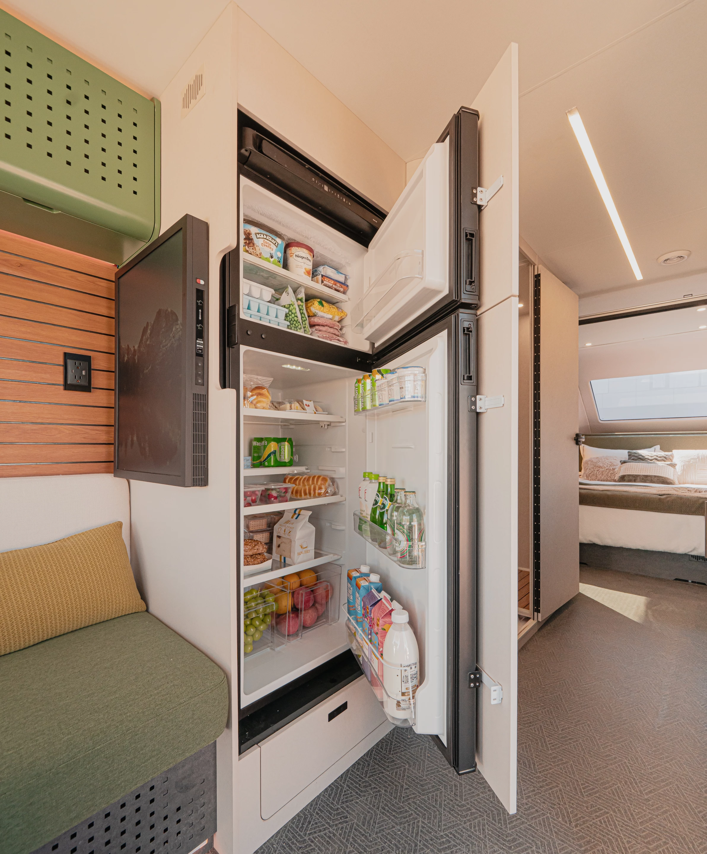 The PG5 includes a 283-L standing door fridge