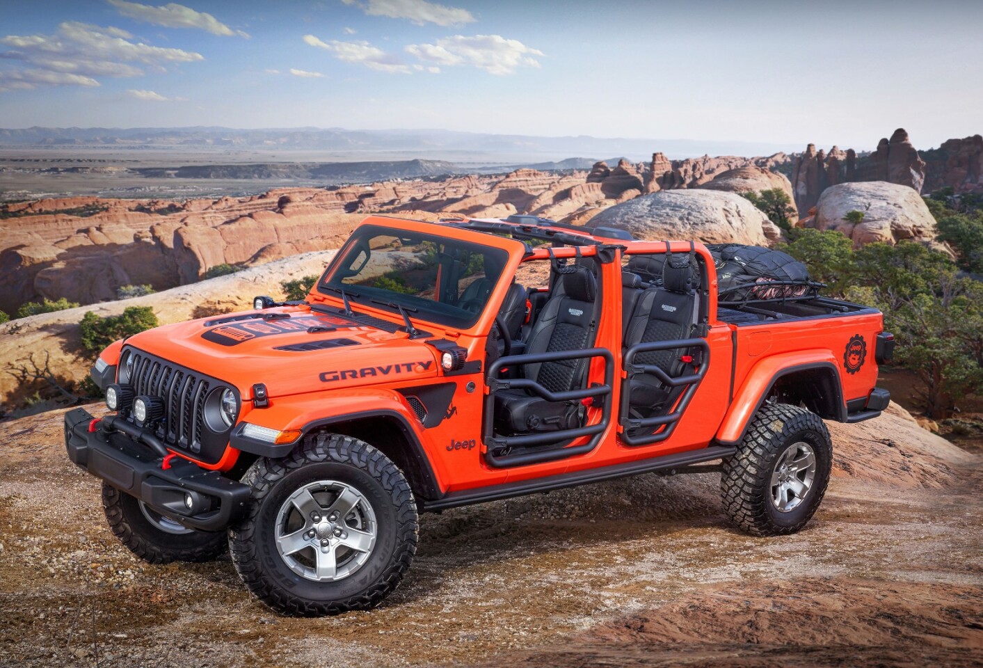 The Jeep Gladiator Gravity includes a set of tube doors and a mesh sunbonnet for an airier ride