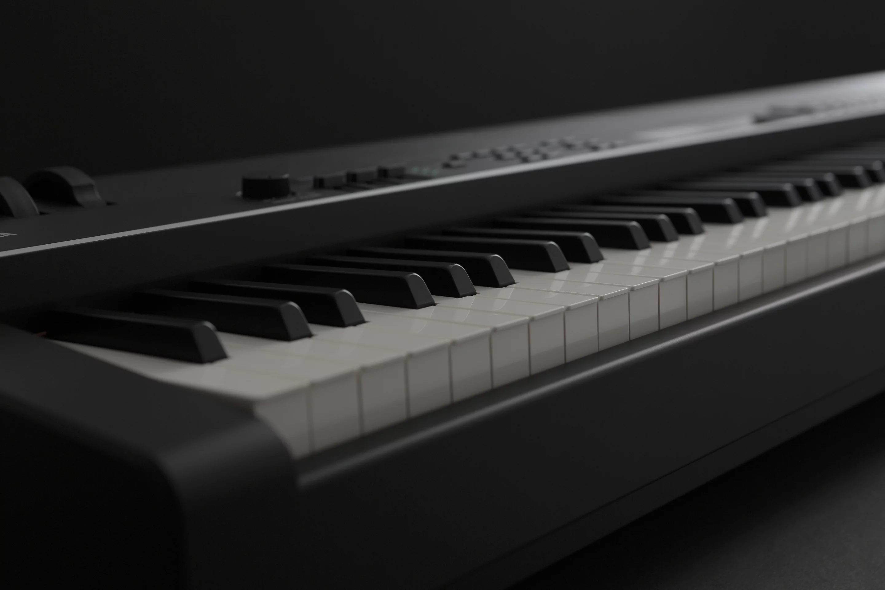 Real wood white keys have been topped with synthetic ivory