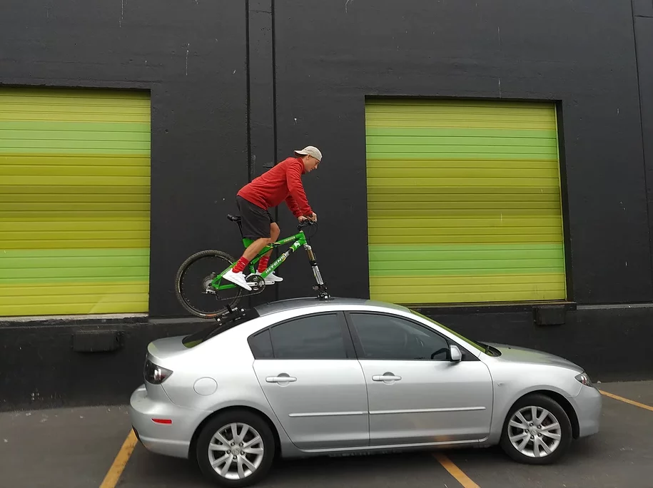 Stag Rack promises its vacuum cups offer the strength you need (but that guy better hope those cups were mounted under 4 hours ago)