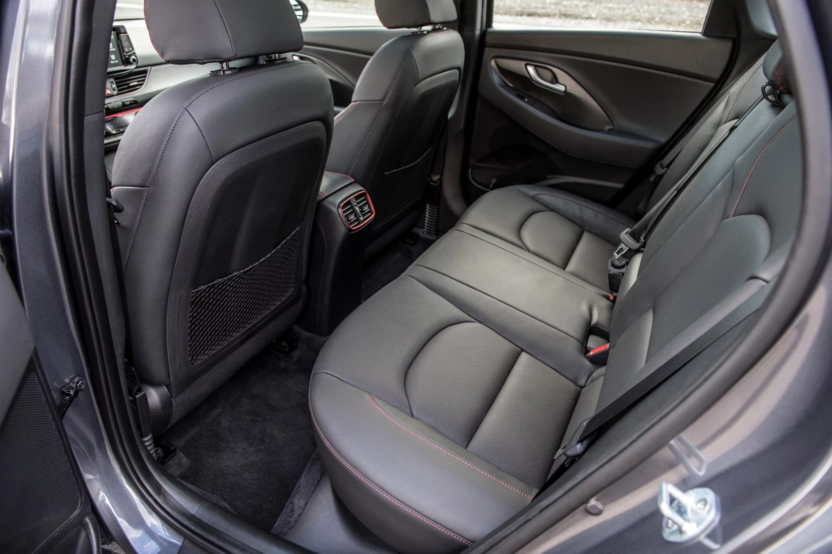 Seating in the 2018 Elantra GT Sport is comfortable and well made, though the thigh bolsters can be a bit thick for those of us made for long winters