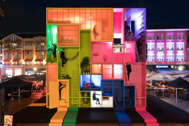 The nine colorful blocks that make up the nine-meter-tall (30 ft) Wego installation are stacked together in a Tetris meets Snakes and Ladders kinda way
