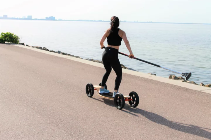 The SlingStick is used to propel the SlingBoard rider along