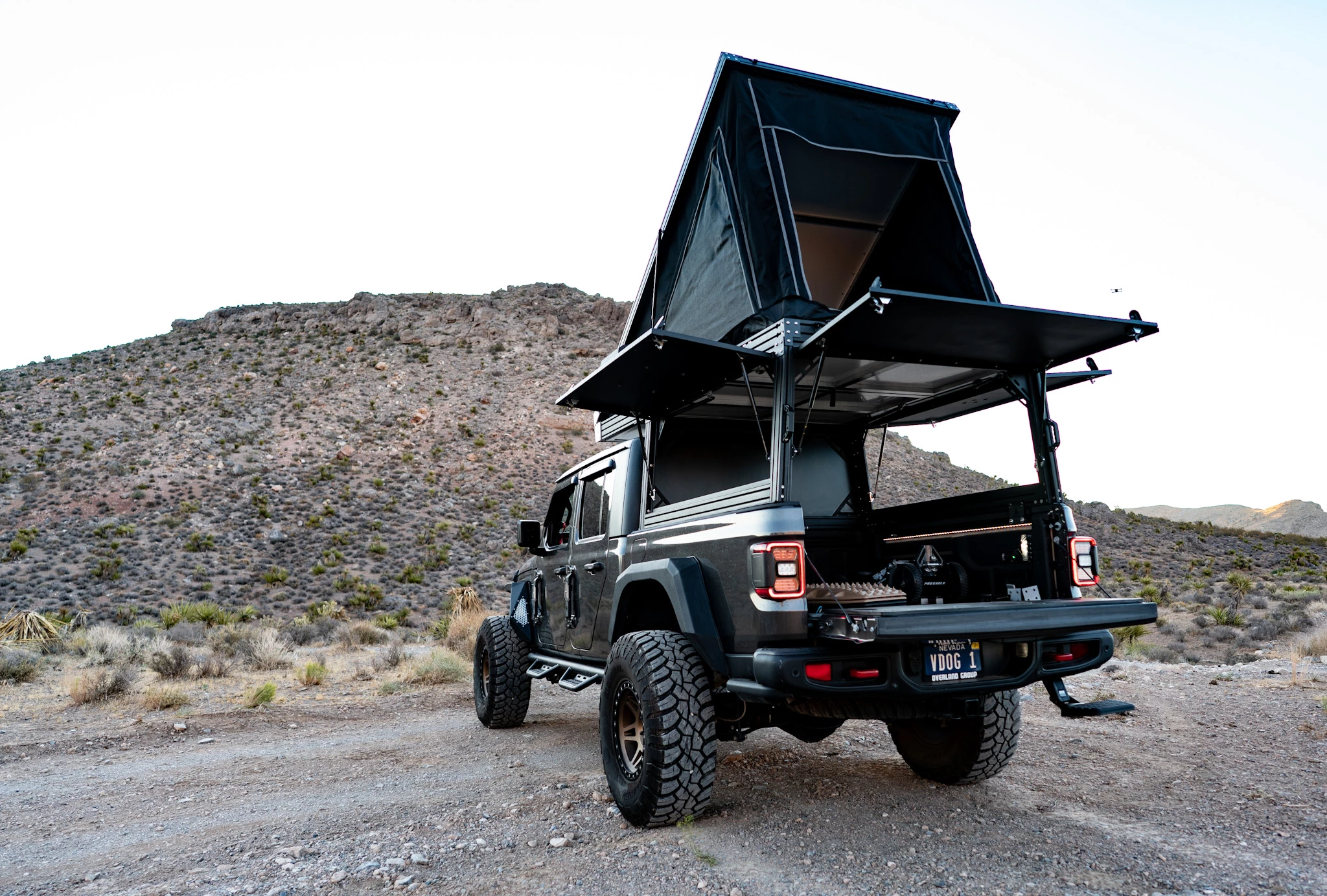 The Packout topper comes standard with three gullwing hatch doors - a swinging tailgate and windows are available optionally