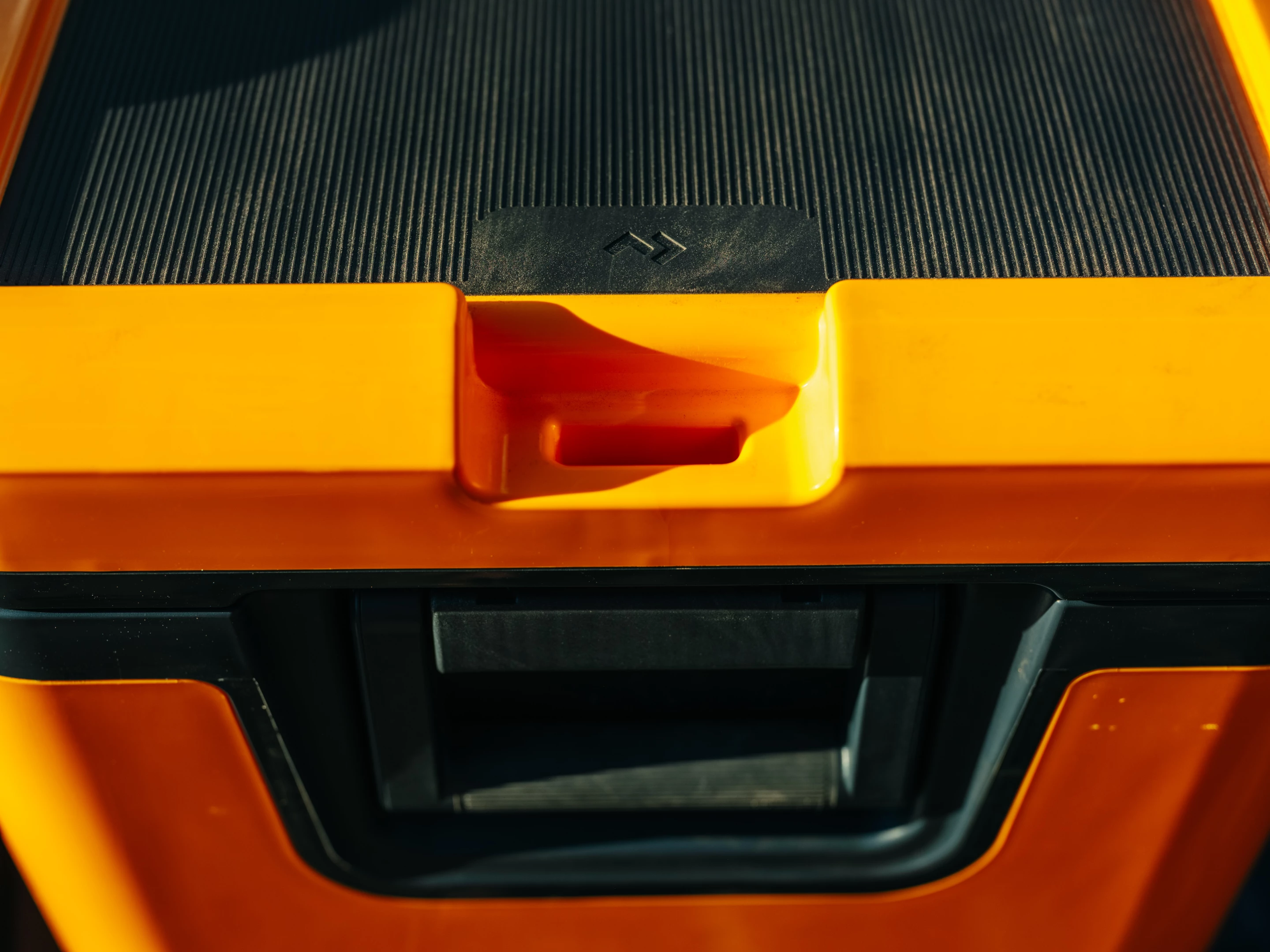 The Recon hard coolers include a traction top and recesses designed to nest the feet of the cooler(s) on top