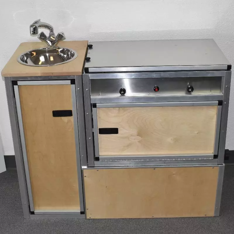 The TK Van Kitchen attaches directly to the van floor or to rails or D-rings