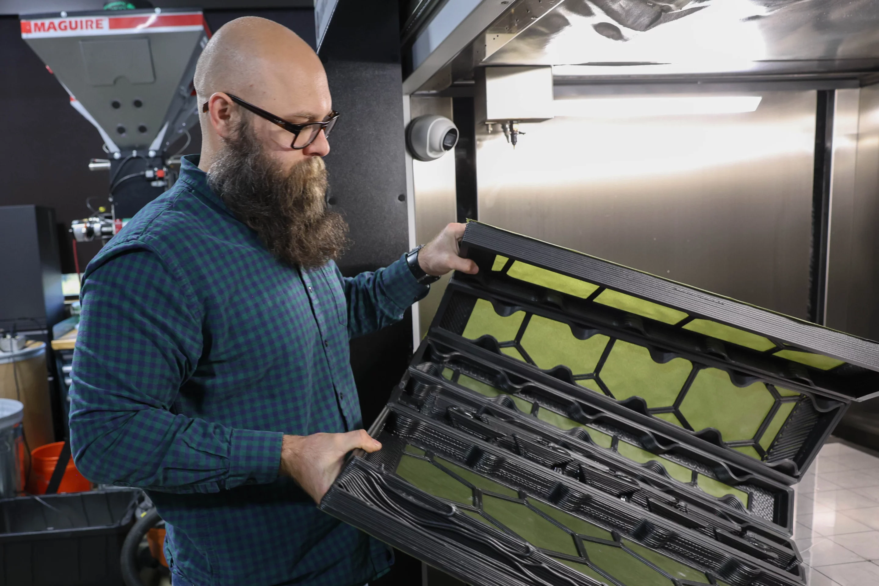 ORNL’s Steven Guzorek with one of the flat-to-foldable structures