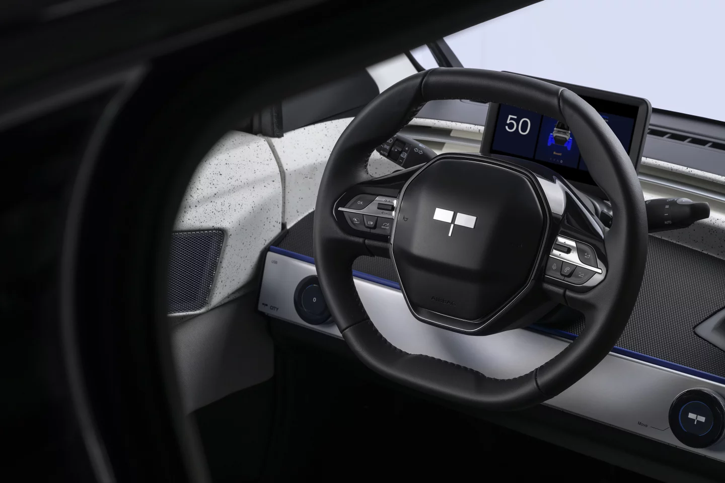 It ain't the roomiest cabin, but there's plenty of amenities, including phone connectivity and steering wheel controls