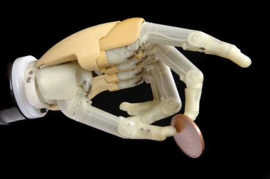 The iLimb hand, from Touch Bionics, demonstrating a grip with the second finger.