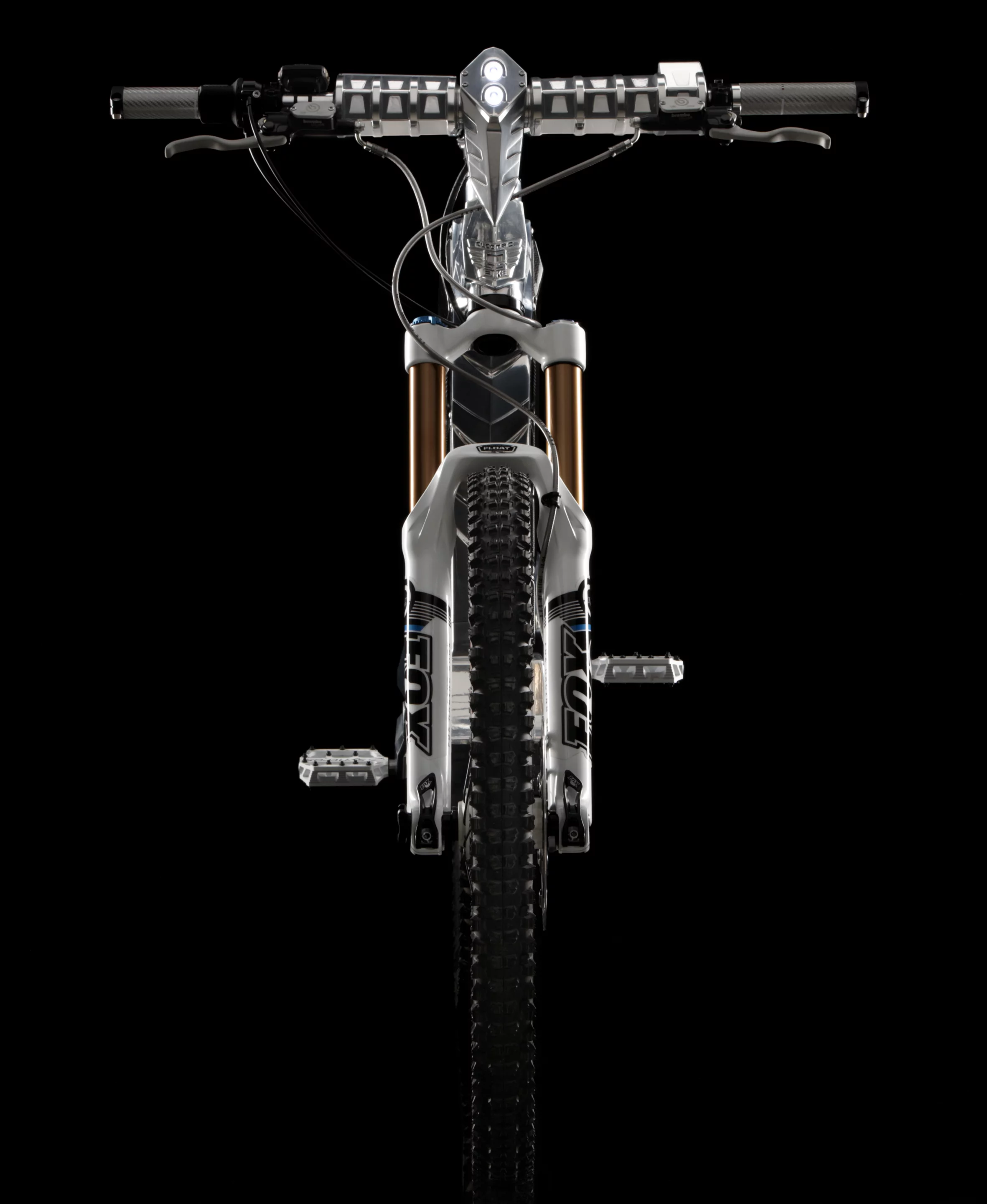 Front view of the Beast showing the built-in LED headlight, Fox suspension and one piece handlebar and stem