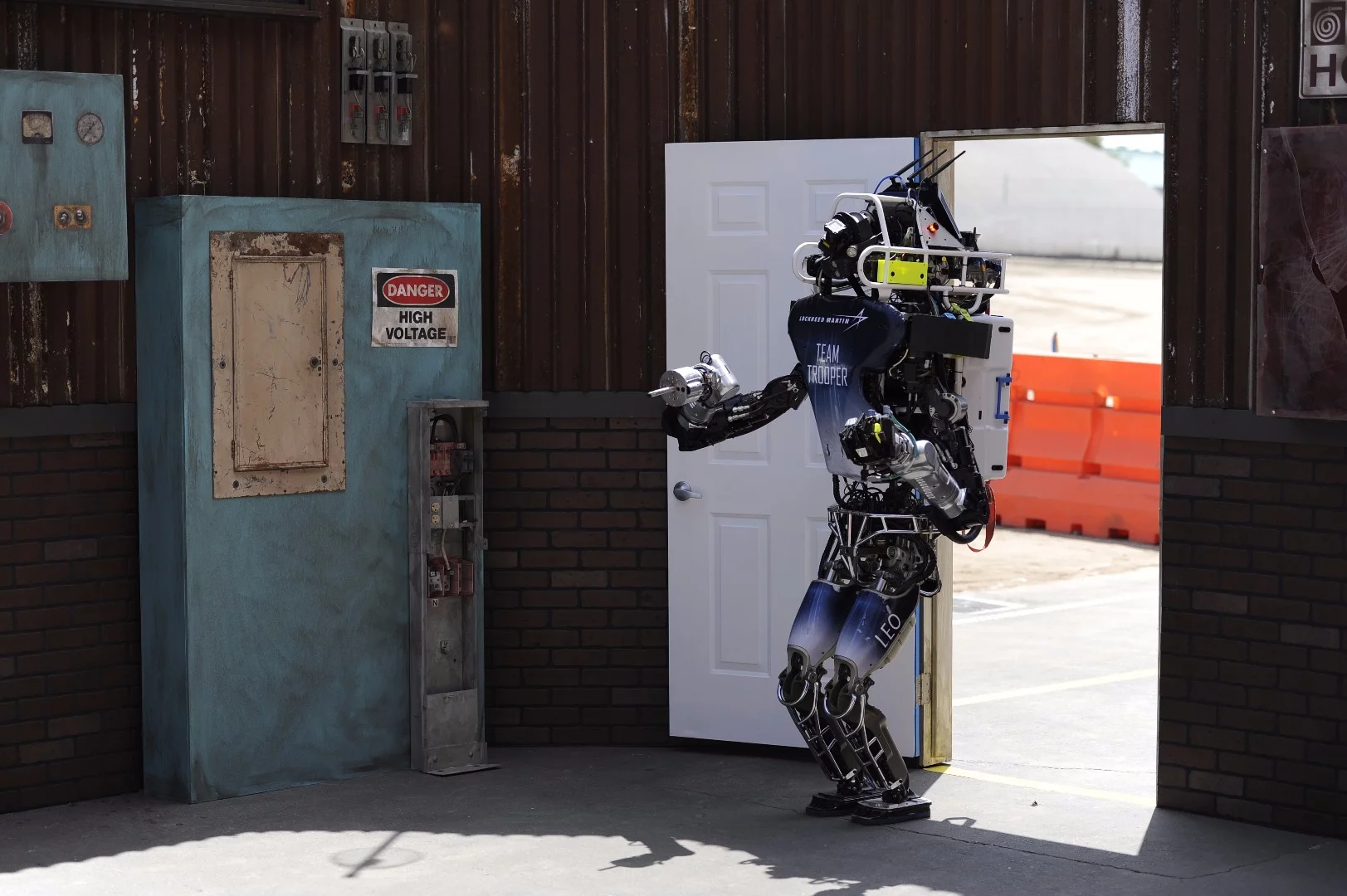 Leo entering the room