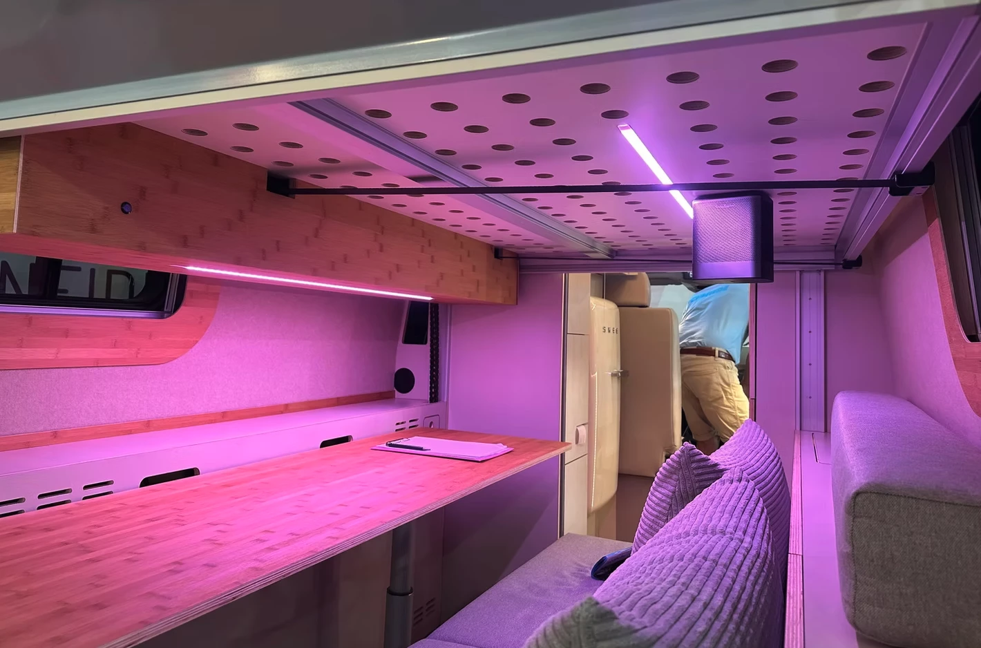 Here you can see the projector hanging off the bed, which casts a picture to the right of the window on the wall over the desk (when the bed is fully lifted to the ceiling)