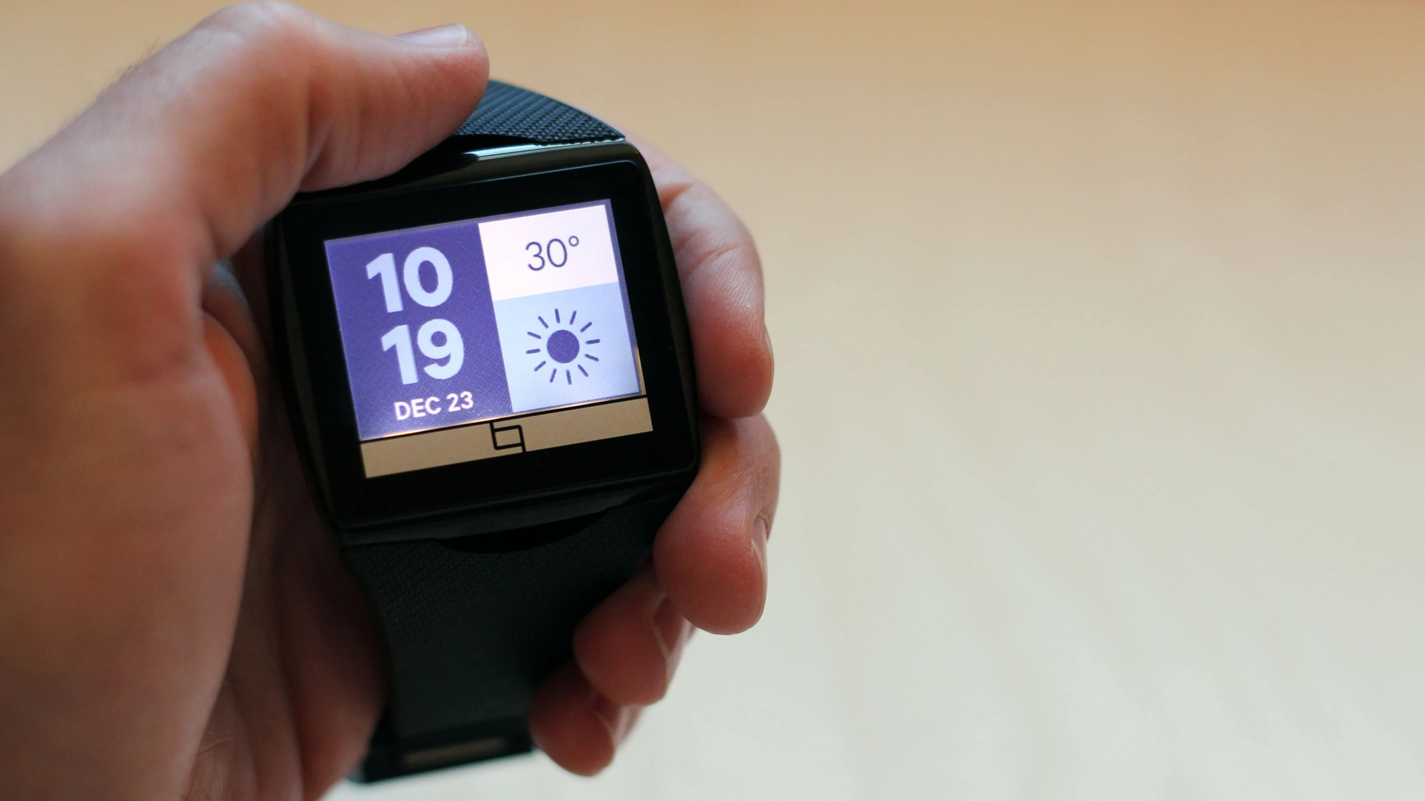Double tap the watch's band just above the screen to activate the backlight