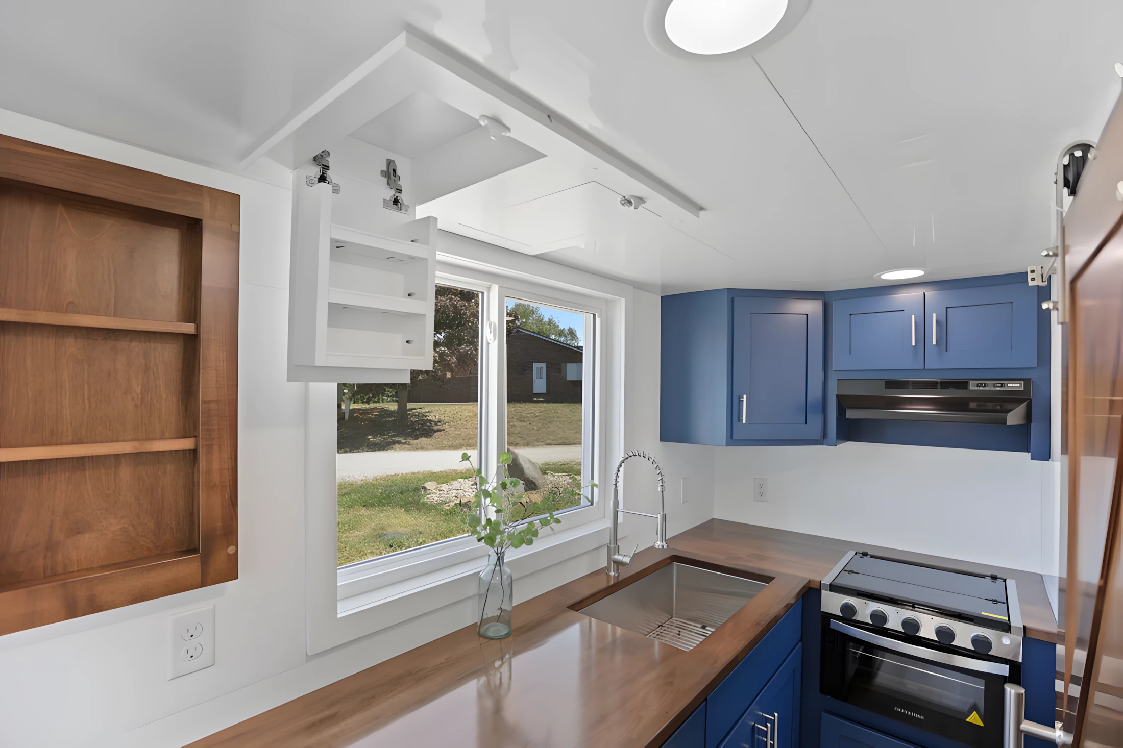 The Cerceaux's kitchen features ample storage space, including drop-down cabinets