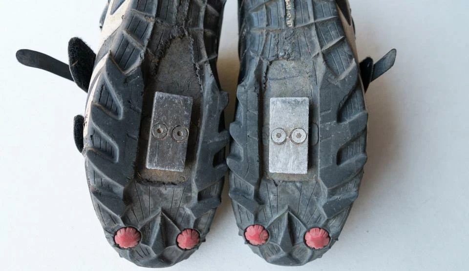 The magnetic cleats, attached to the rider's shoes