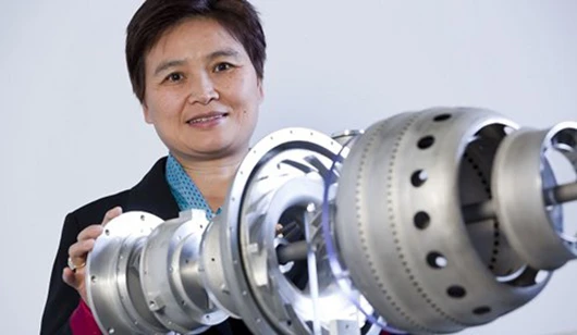 Prof. Xinhua Wu with one of the engines (Photo: Monash University)
