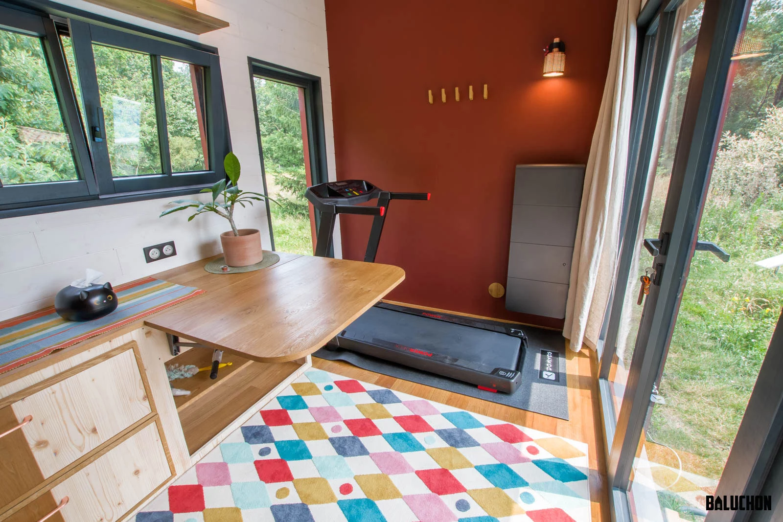 In the place where you'd expect to find a living room, the Browny instead contains an exercise area