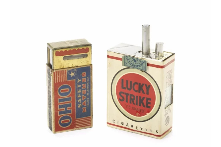 The spy camera was disguised as a cigarette pack and the light meter as a match box