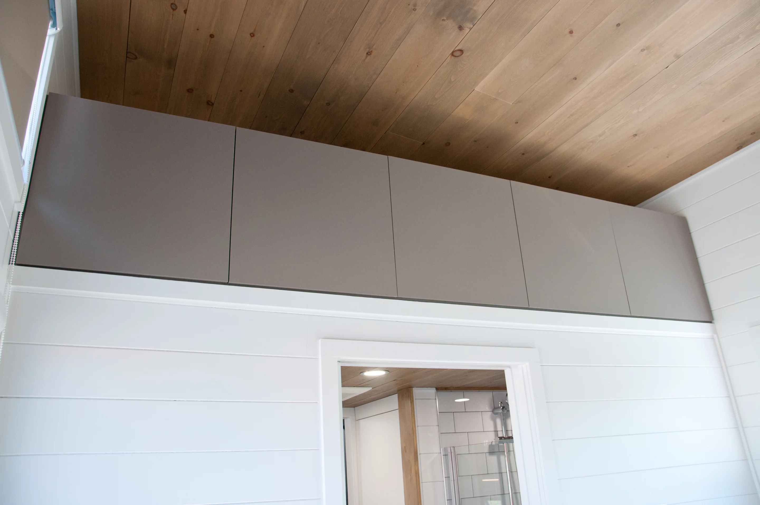 The Magnolia V6's loft space is used for storage and features large storage units