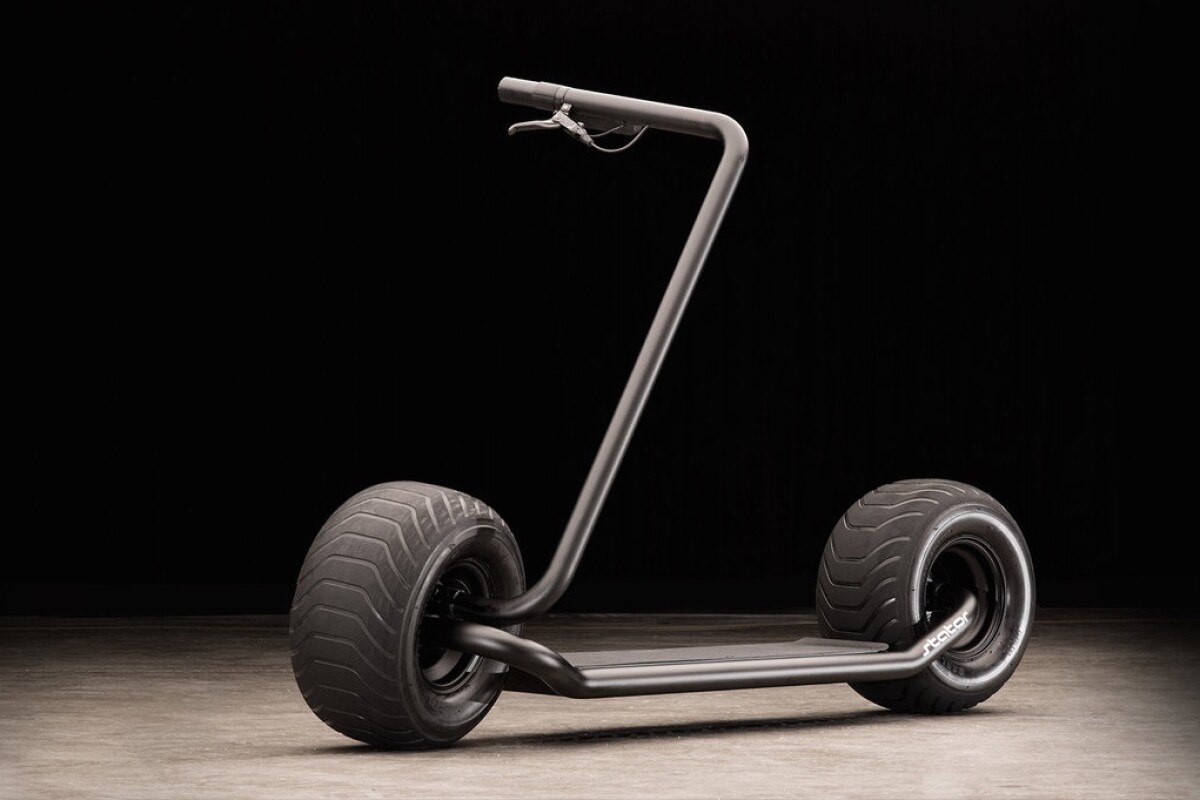 Stator folding electric scooter pairs plump wheels and wiry frame