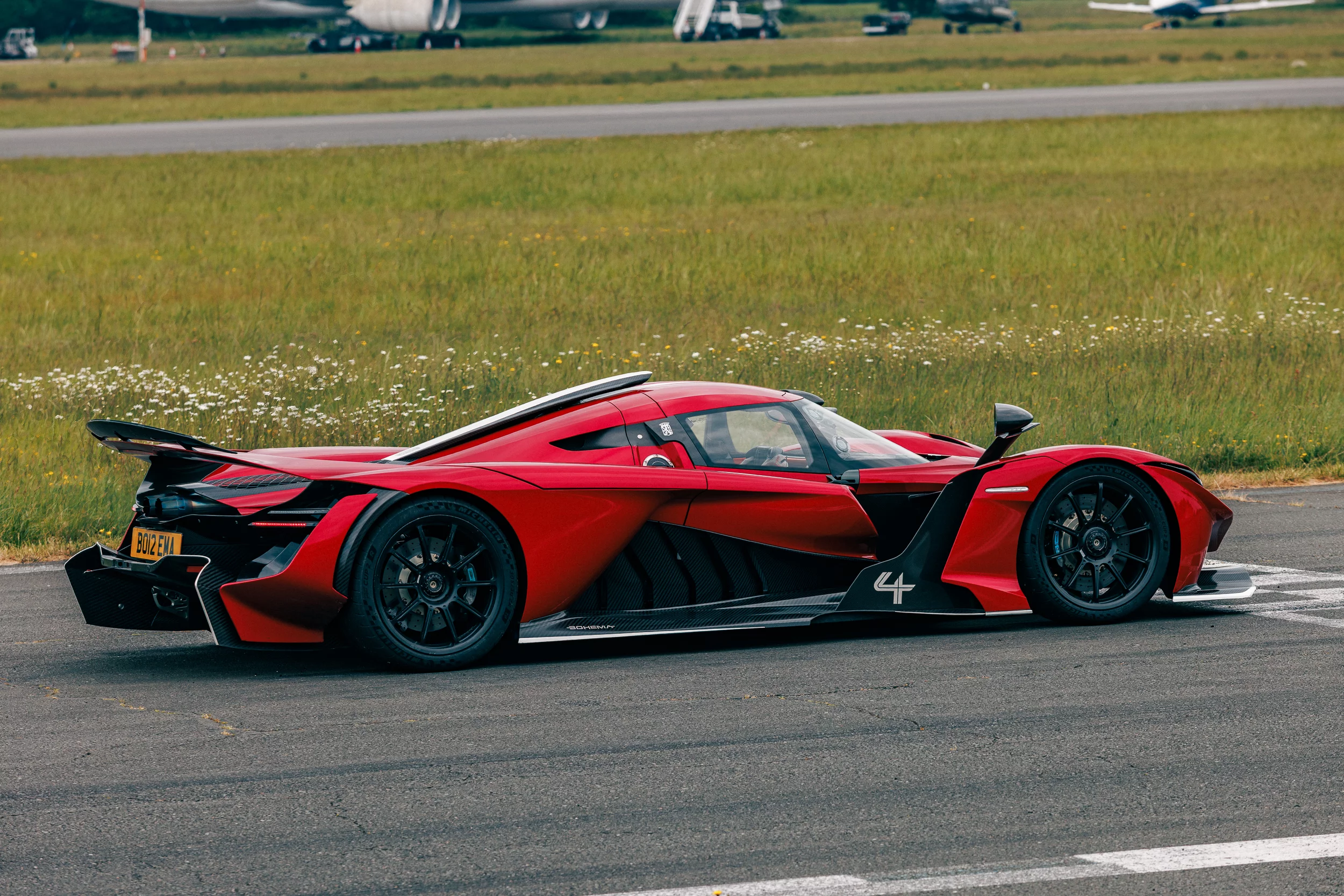 The Praga is, in fact, road legal, but its racing-focused suspension and carbon ceramic brakes have been designed to perform equally well on the track