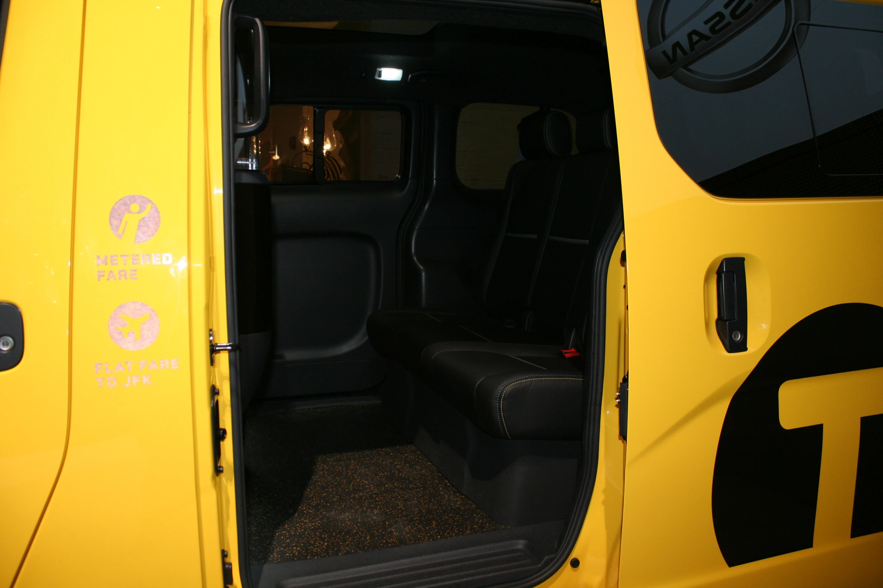 The rear seating of the New York NV200 cab (Photo: Gizmag)
