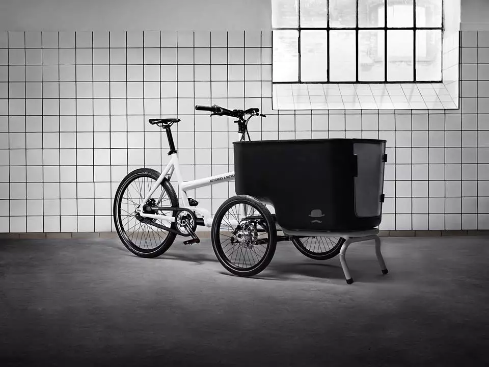 The trike also features a parking stand