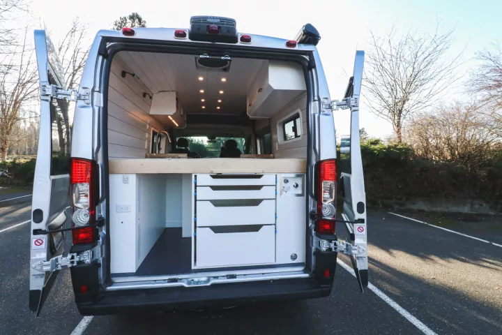 Popping the rear doors on the Chongo camper from Freedom Vans