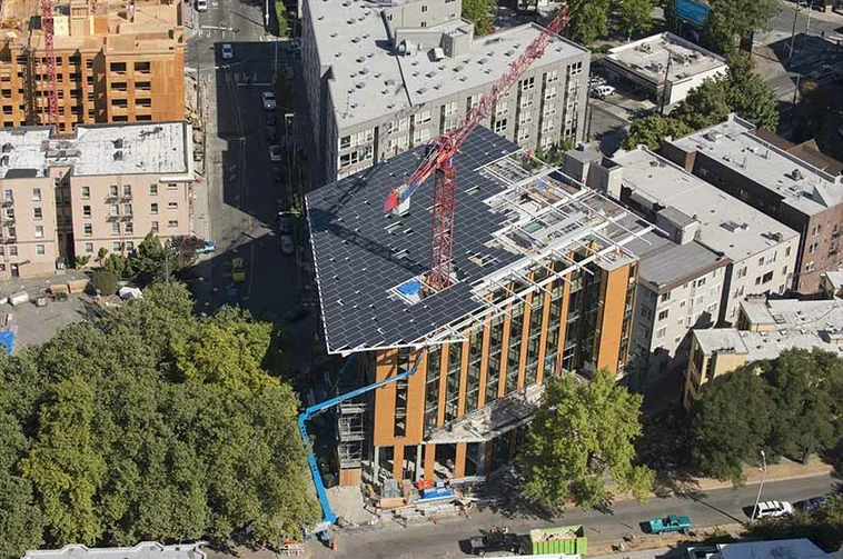 An aerial view of the Bullitt Center, rooftop solar array under construction, September 2012 (Photo: John Stamets)