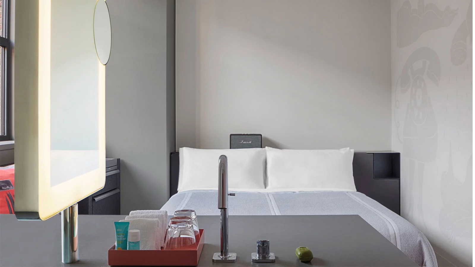 W Amsterdam has 172 guest rooms in a former telephone exchange building and a further 66 rooms in the former home of KAS Bank