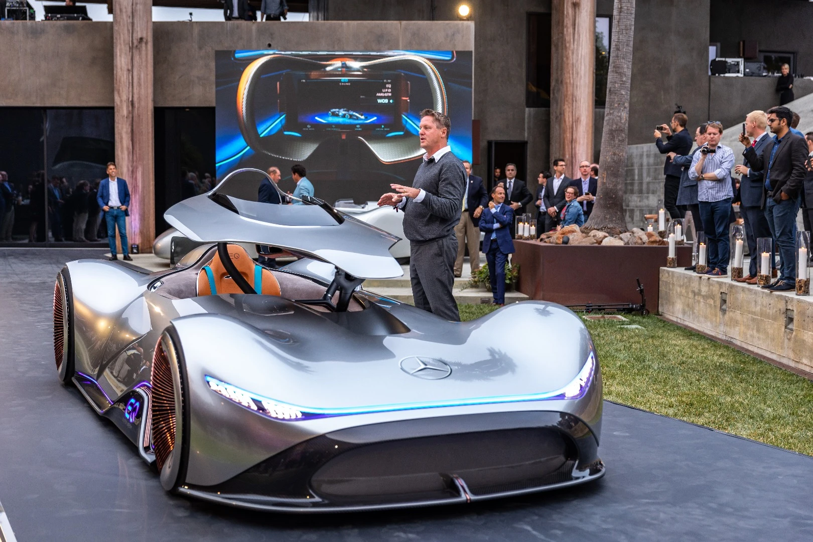 The forward-folding cockpit of the Vision EQ Silver Arrow concept in action