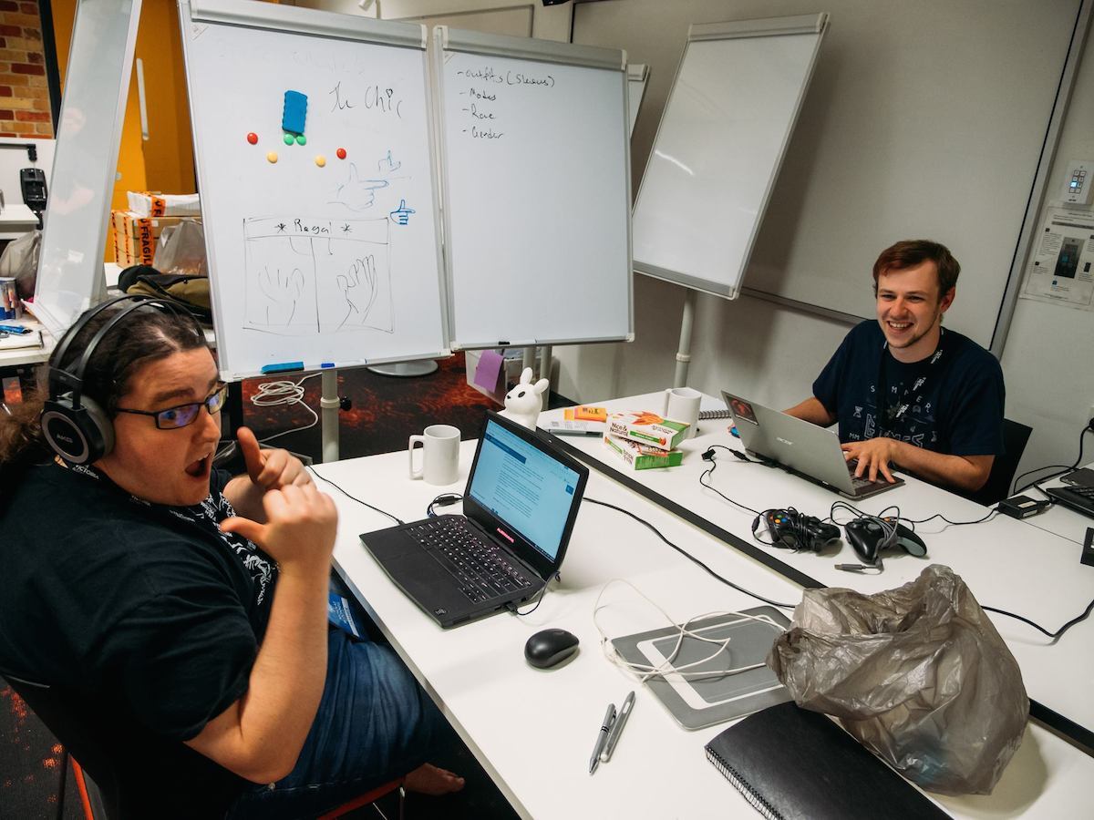 Nicholas McDonnell (left) and Daniel Draper (right) interpreted the Waves theme as the hand gesture, and made a game about competitive hand modeling called Le Chic