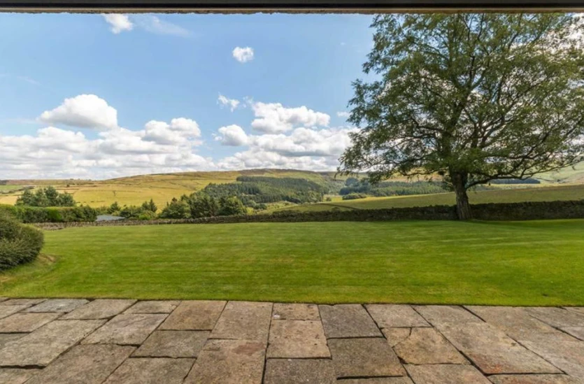 The large glazed doors offer choice views of the nearby Pennine Hills
