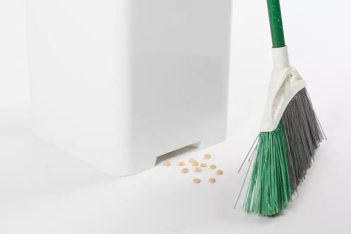 The Bruno garbage can automatically vacuums up whatever is swept into its suction port