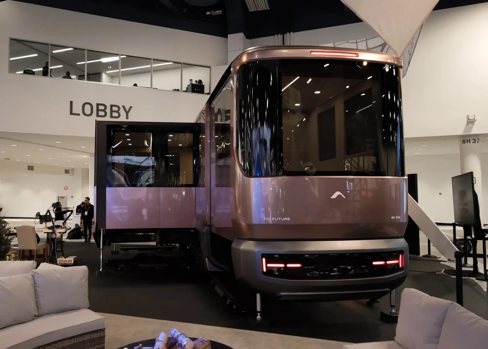 While the AC Future THd motorhome, pictured here at CES 2025, includes a driver's cab, its side and rear expansion units look much the same as the THt trailer's