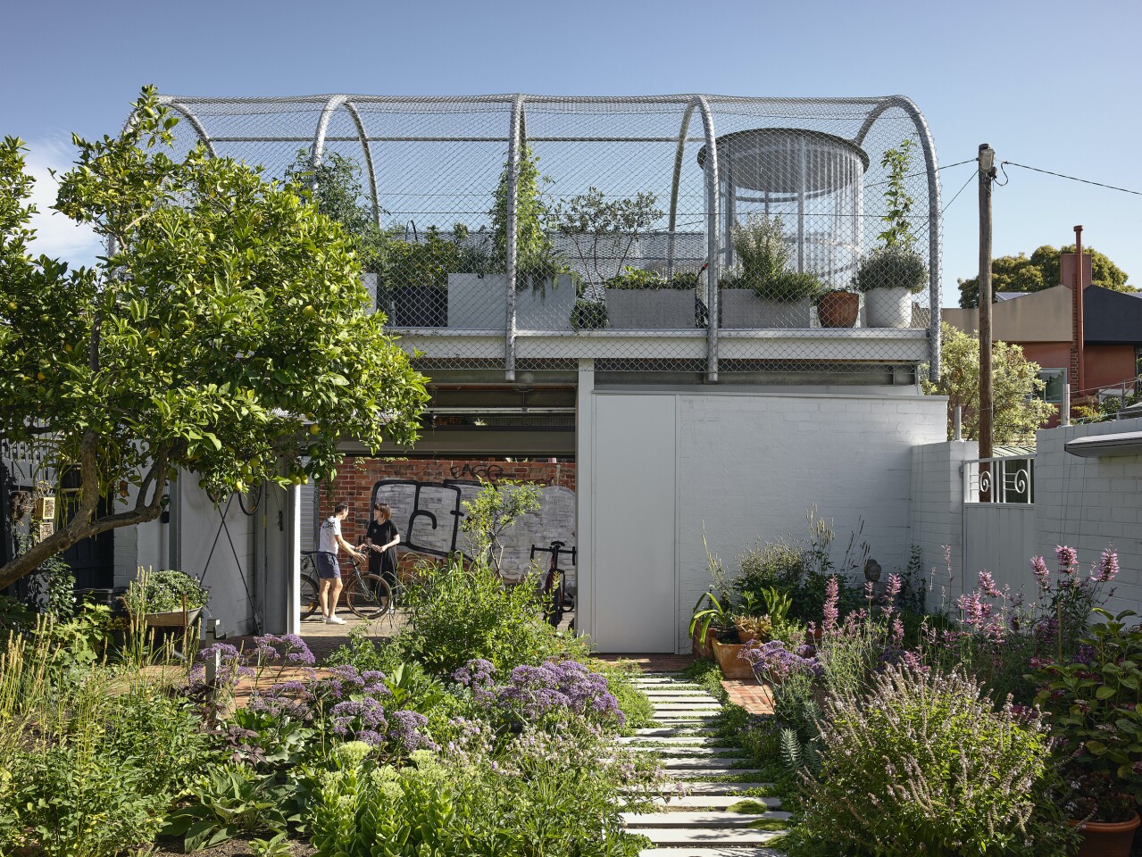 Helvetia, by Austin Maynard Architects, has been transformed from a drab and rather dark home into a light-filled residence that features multiple gardens