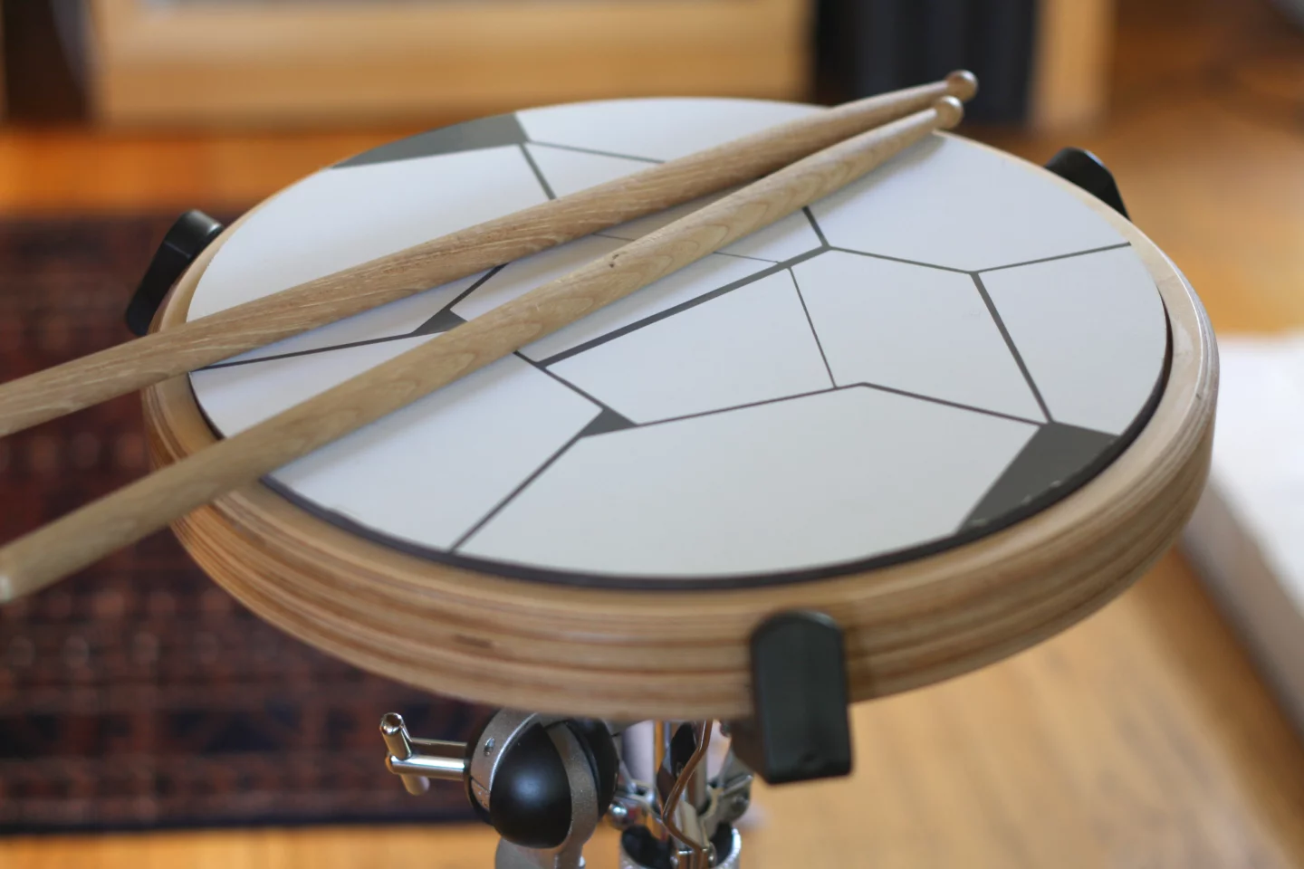 The state of the sensor is digitized at 10-bits and passed back to the iOS application, where algorithms recognize playing gestures based on the result