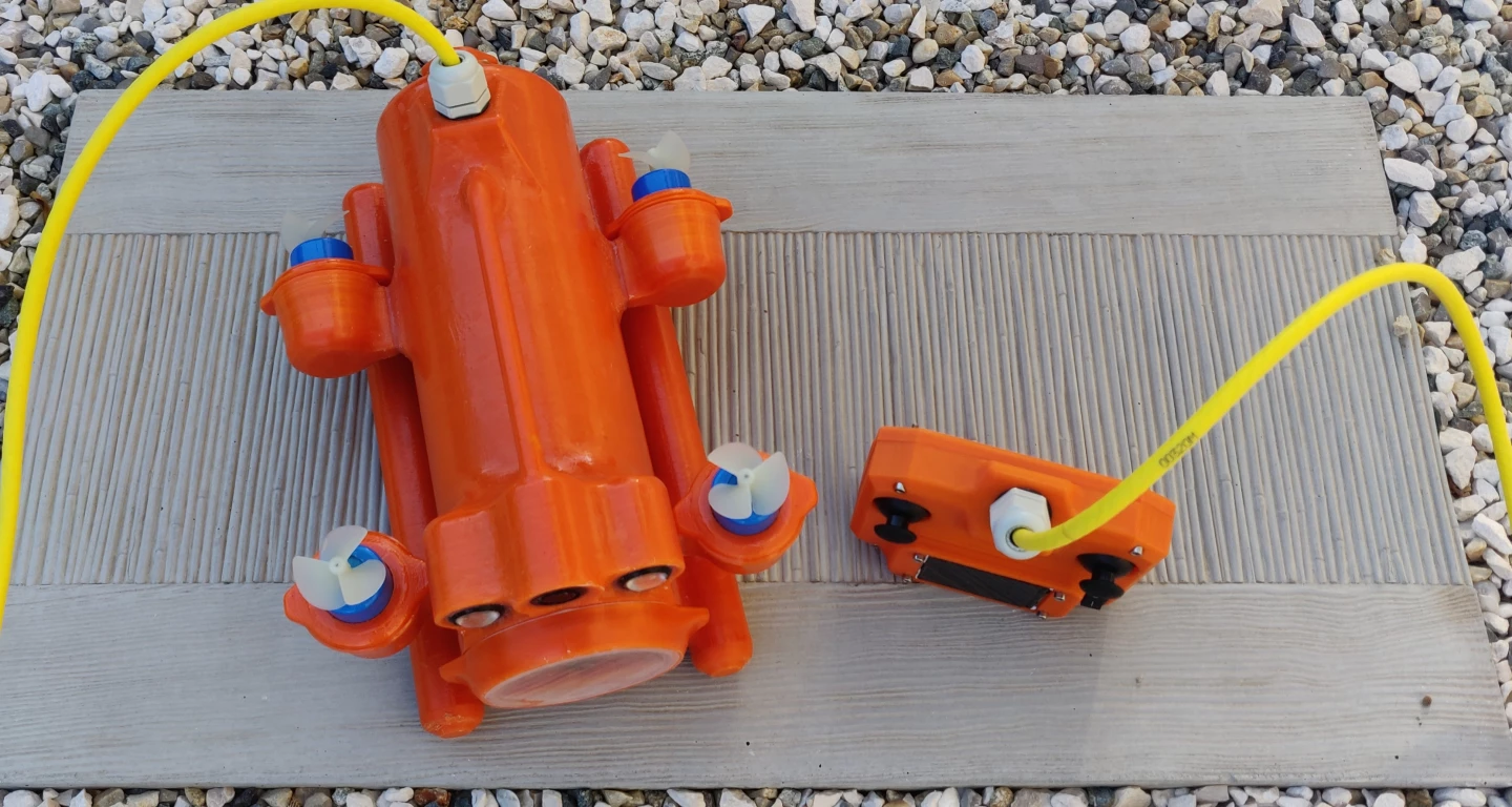 The prototype BentiX drone and its joystick remote