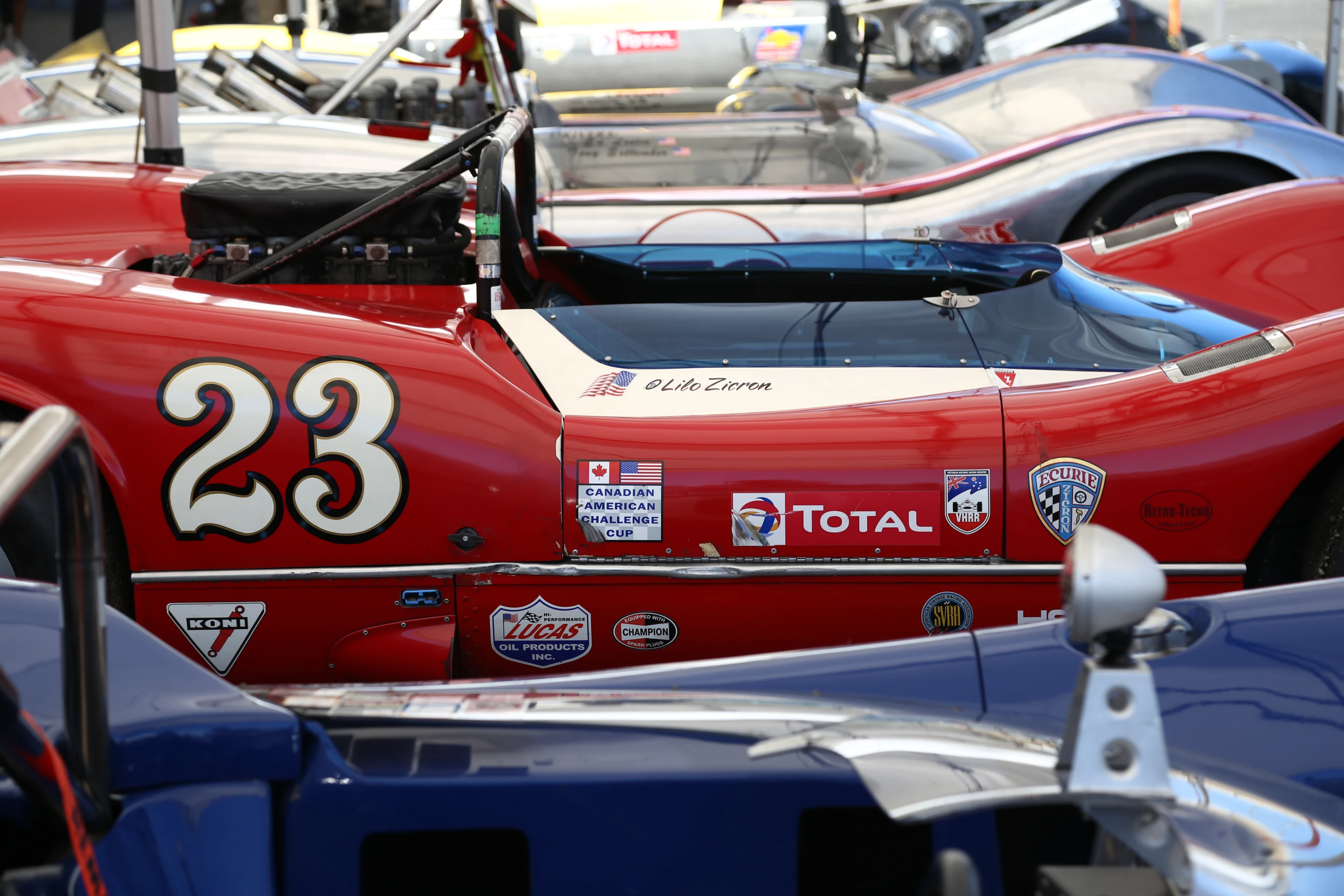 An assortment of 1960s-era racers take shelter from the California sun (Photo: Angus MacKenzie/Gizmag.com)